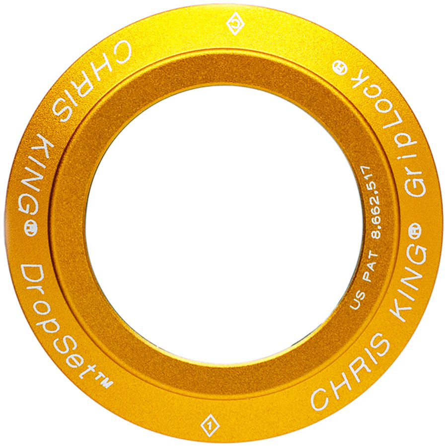 Chris King DropSet 5 Headset Bearing Cap and GripLock Assembly - Matte Gold 50th Anniversary MPN: PHS819Y2 UPC: 841529278941 Headset Small Part DropSet Headset Bearing Cap and GripLock Assembly