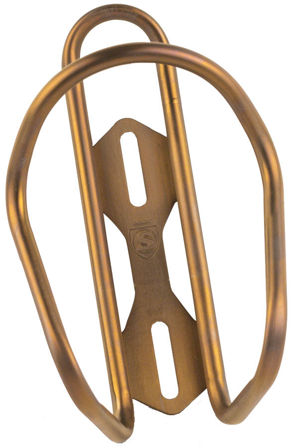 Silca Anodized Titanium Bottle Cage - Bourbon MPN: AM-HY-002-ASY-0700 UPC: 810093160846 Water Bottle Cages Anodized Titanium Bottle Cage
